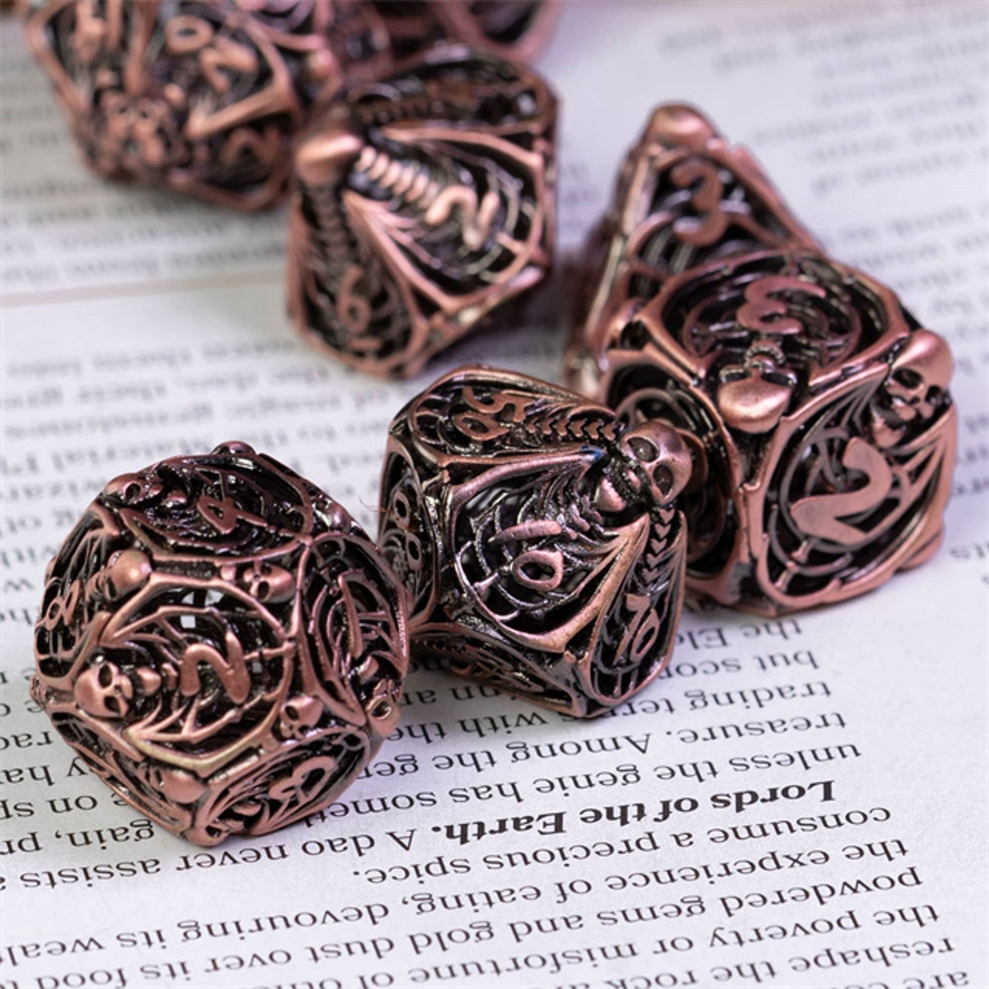 Hollow Deadly Bones Copper Metal DND/TTRPG Dice set - Dicemaniac