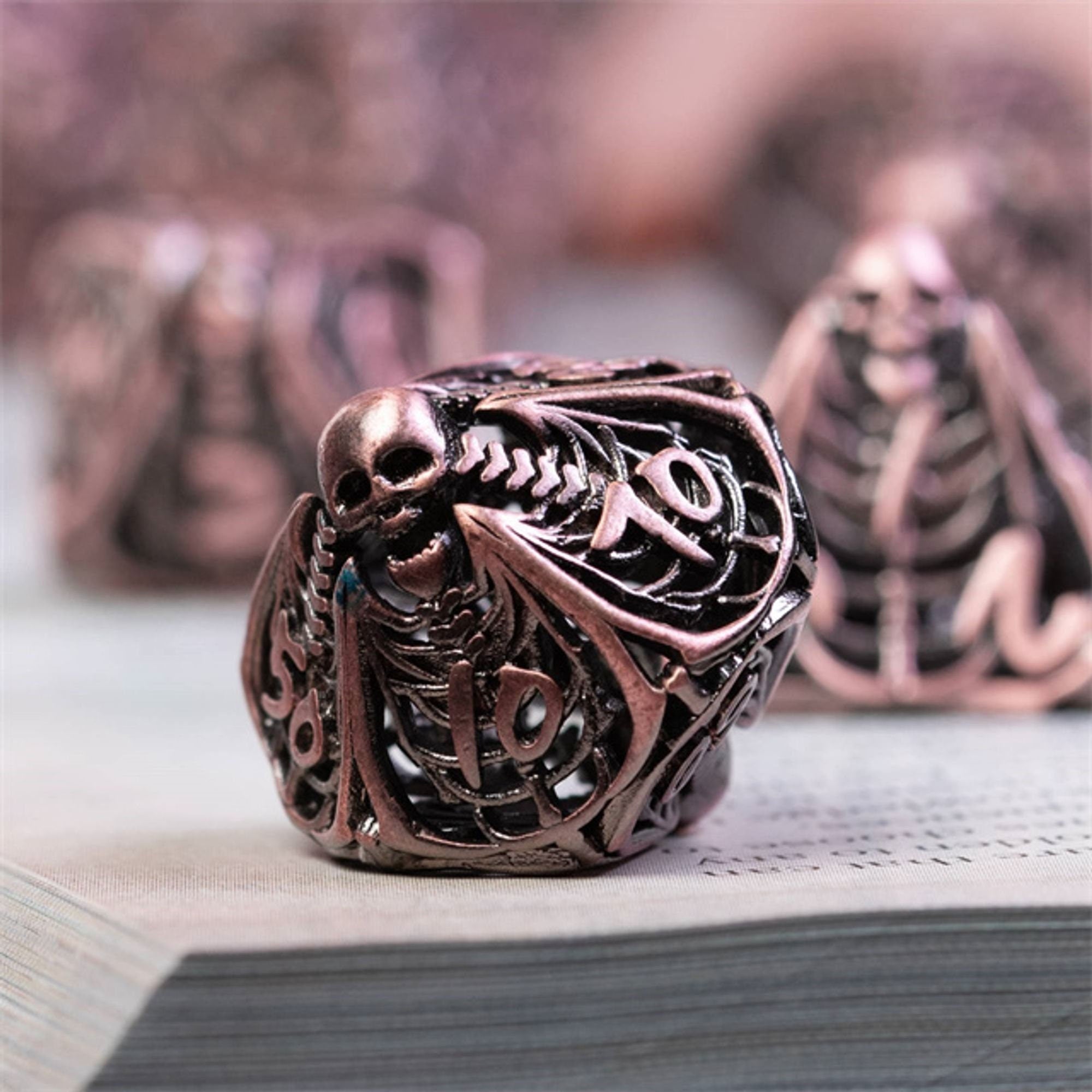 Hollow Deadly Bones Copper Metal DND/TTRPG Dice set - Dicemaniac