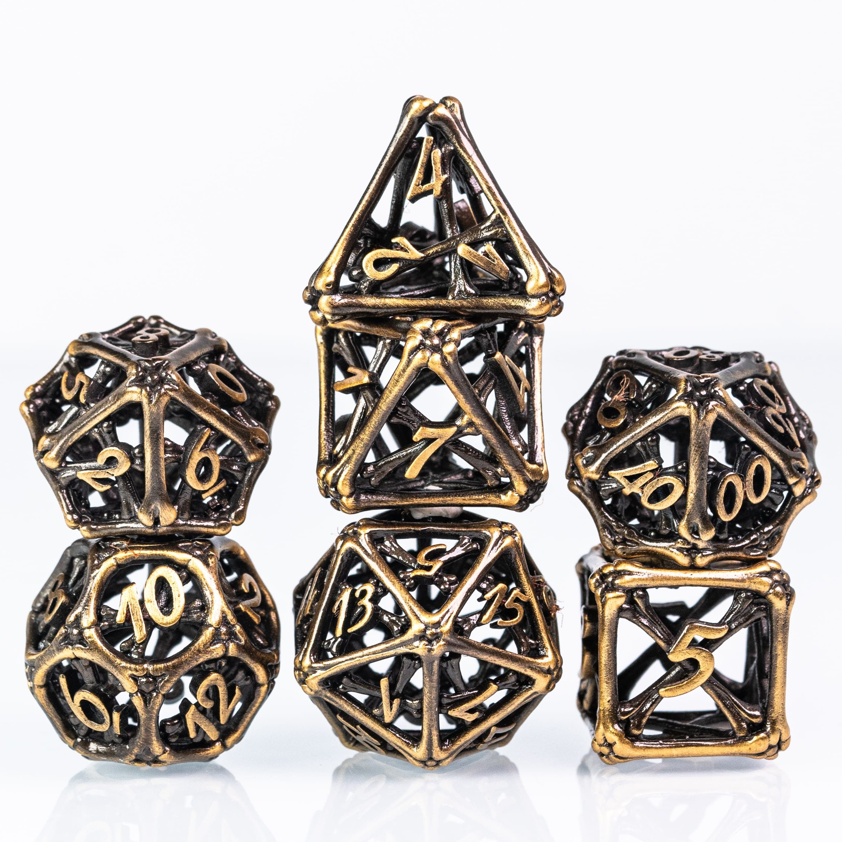 Hollow Antique Gold Hand Crafted Bones Metal DND/TTRPG Dice set - Dicemaniac