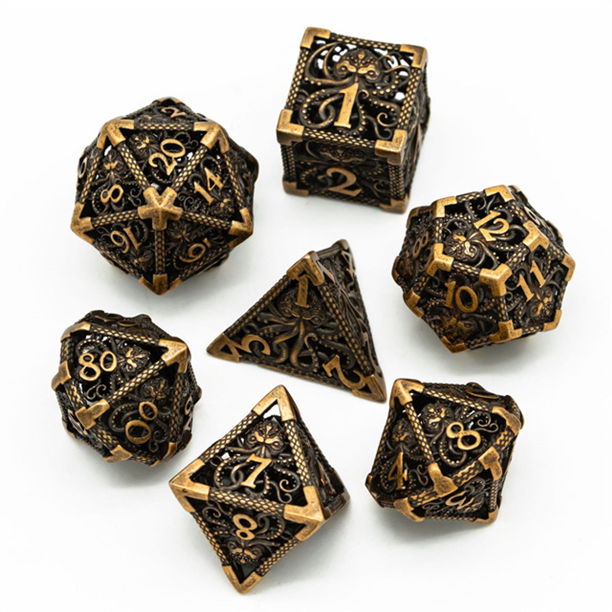 Hollow Octopus Aged Golden Metal DND/TTRPG Dice set - Dicemaniac