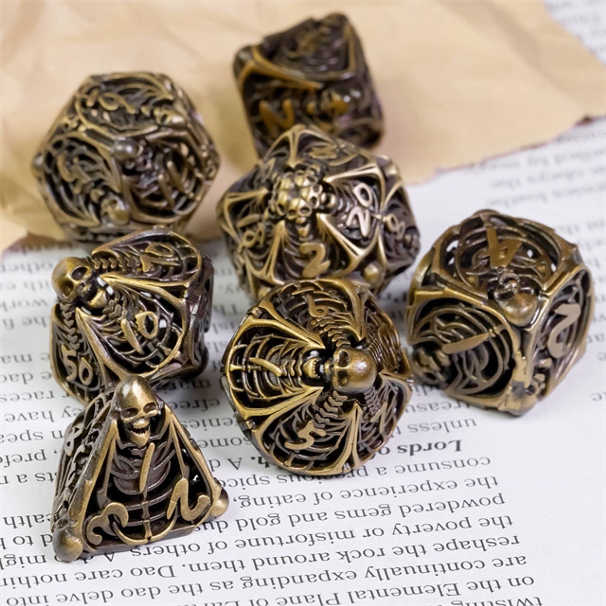 Hollow Deadly Bones Aged Golden Metal DND/TTRPG Dice set - Dicemaniac