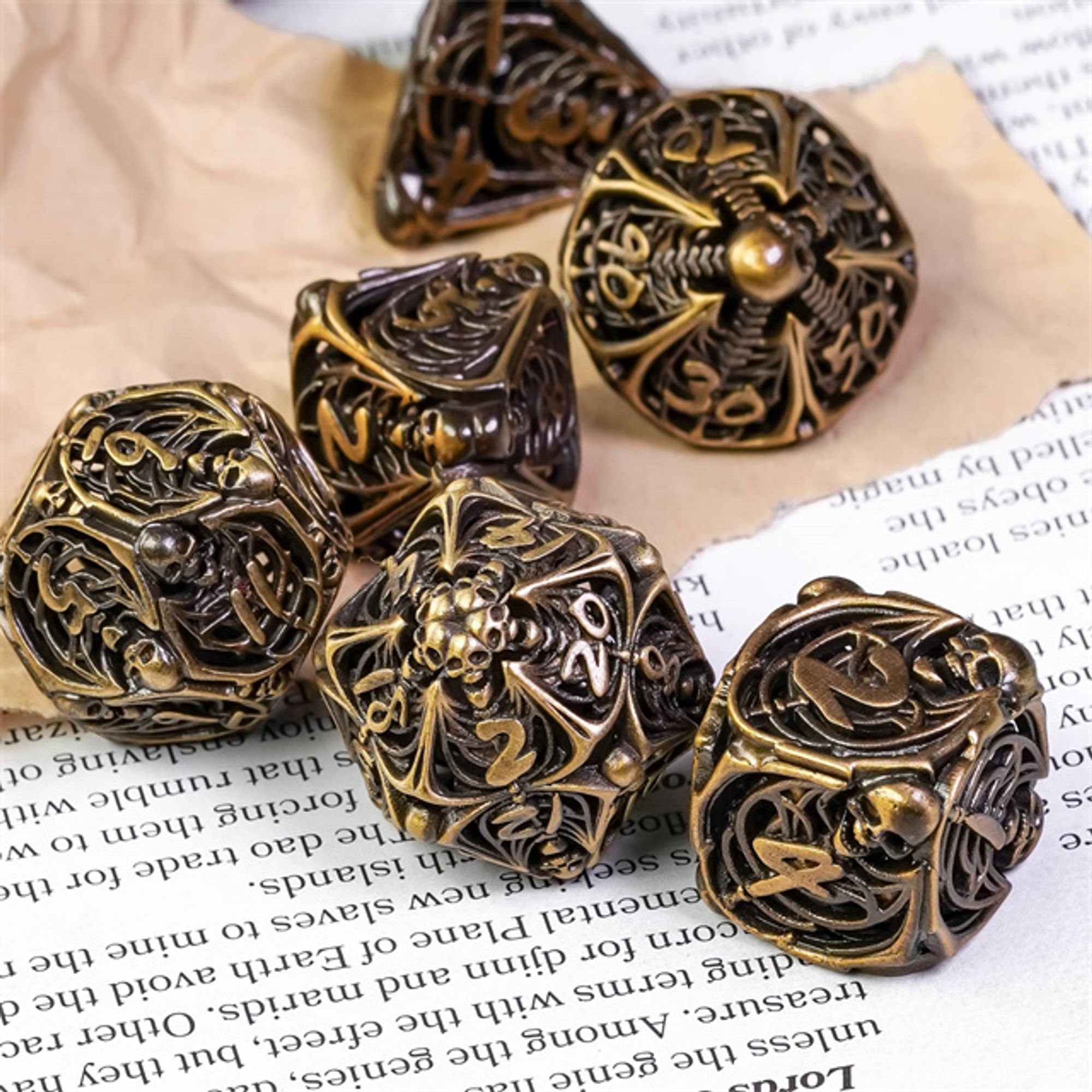 Hollow Deadly Bones Aged Golden Metal DND/TTRPG Dice set - Dicemaniac