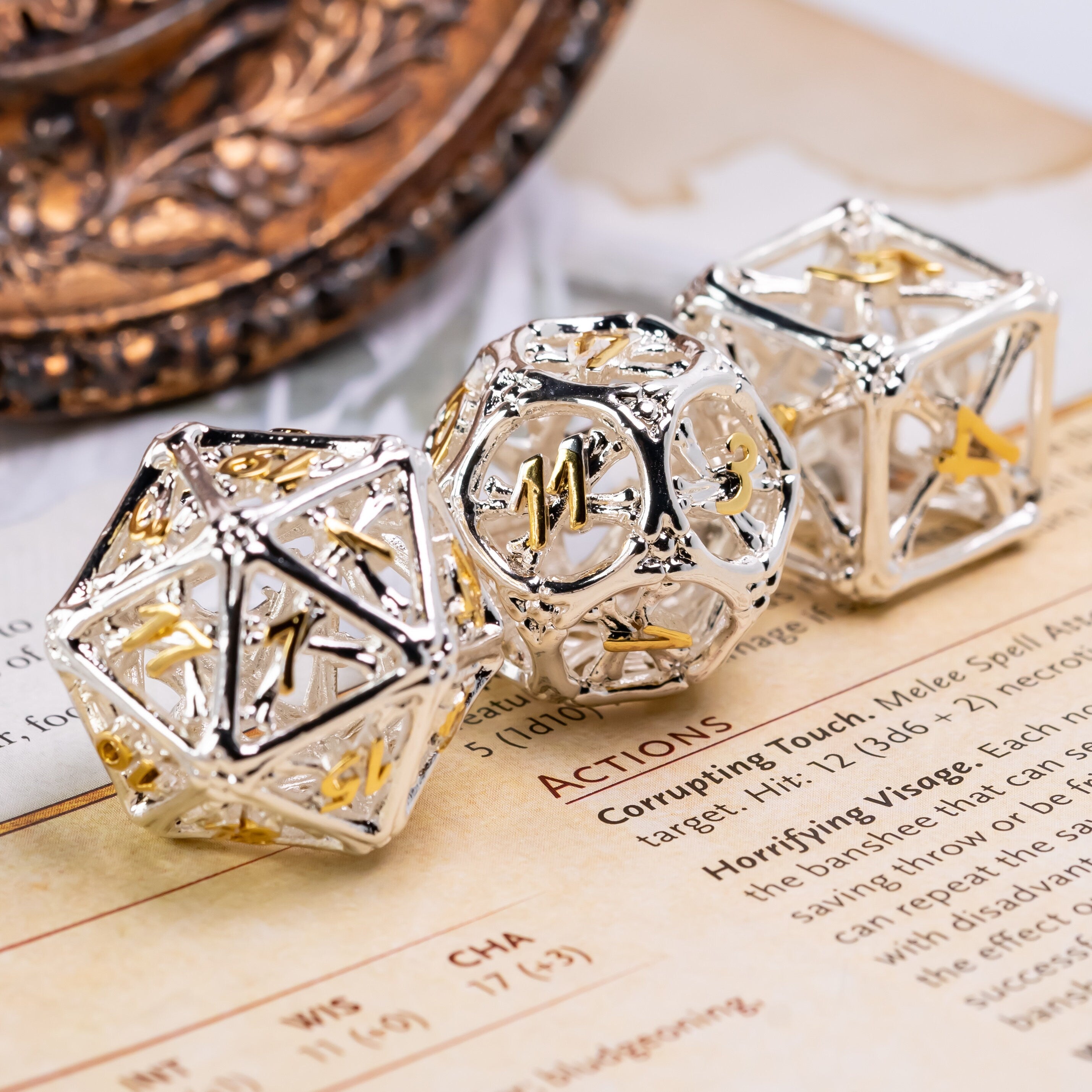 Hollow Shiny Silver and Gold Bones Metal DND/TTRPG Dice set - Dicemaniac